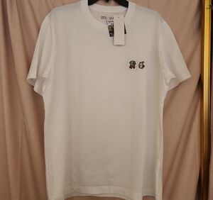 White Graphic Tee with Embroidered Accents